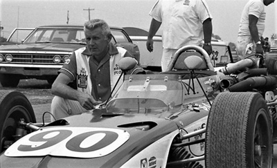AJ Watson with his 1968 Watson Indy car at IRP in July 1970. Copyright Ralph Hibbard 2024. Used with permission.