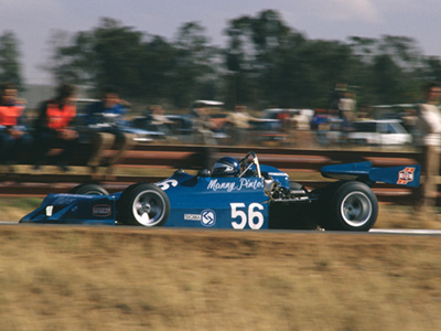 Manny Pinto in his Chevron B29 at Welkom in 1983. Copyright David Pearson (<a href='http://www.motoprint.co.za/' target='_blank'>motoprint.co.za</a>) 2024. Used with permission.