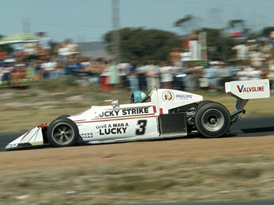 Dave Charlton in the Scribante/Lucky Strike Racing March 76B at Roy Hesketh in 1977. Copyright David Pearson (<a href='http://www.motoprint.co.za/' target='_blank'>motoprint.co.za</a>) 2024. Used with permission.