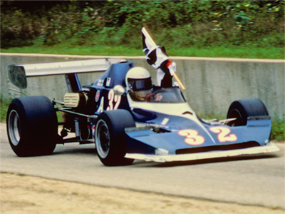 Robert Lybarger in his Lola T460/T560 after a win at BlackHawk Farms in September 1980. Copyright Tom Schultz 2021. Used with permission.